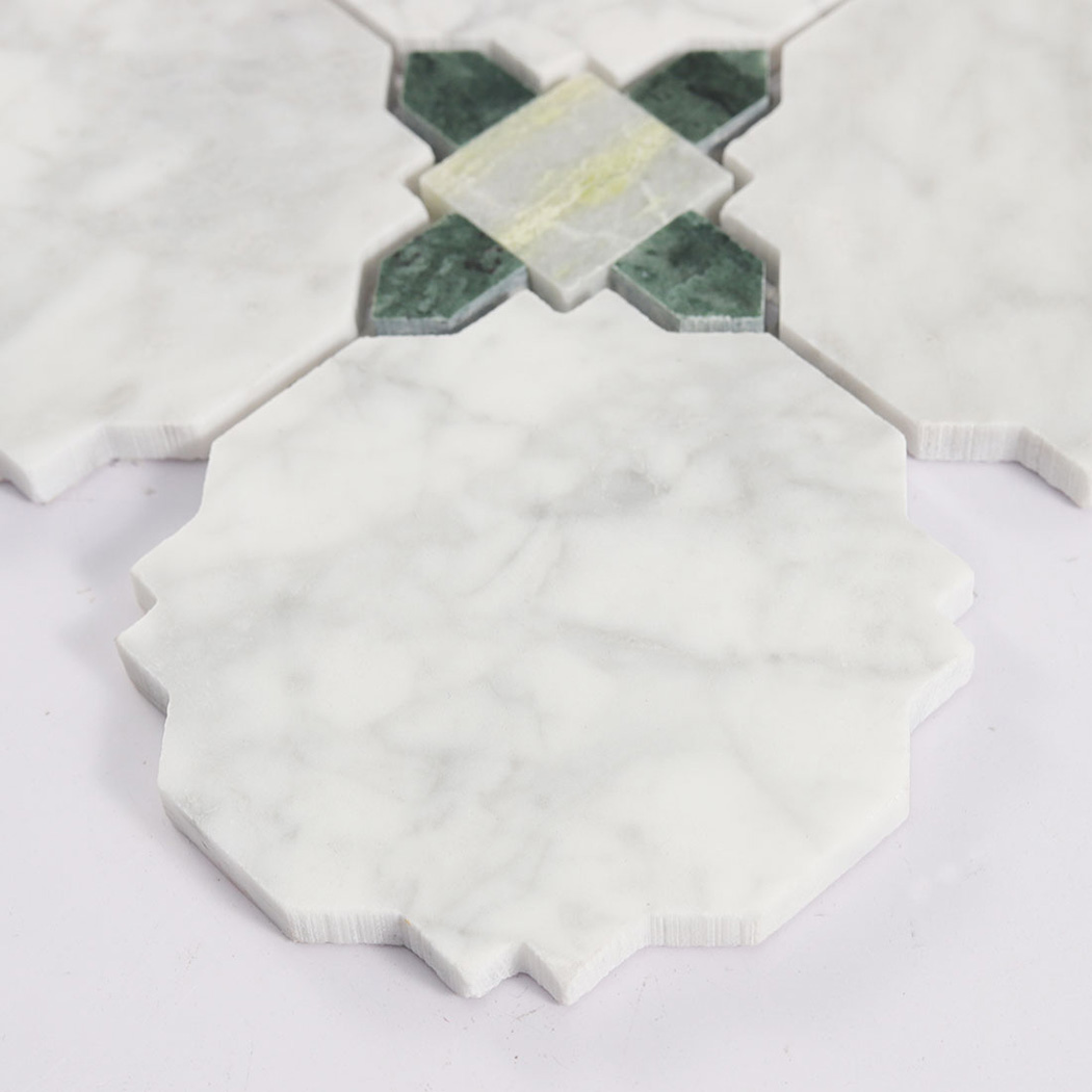 Side close up of white marble geometric mosaic tile showing carved edge thickness