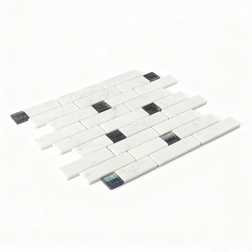 Perspective view of white marble subway mosaic sheet with dark glass square accents