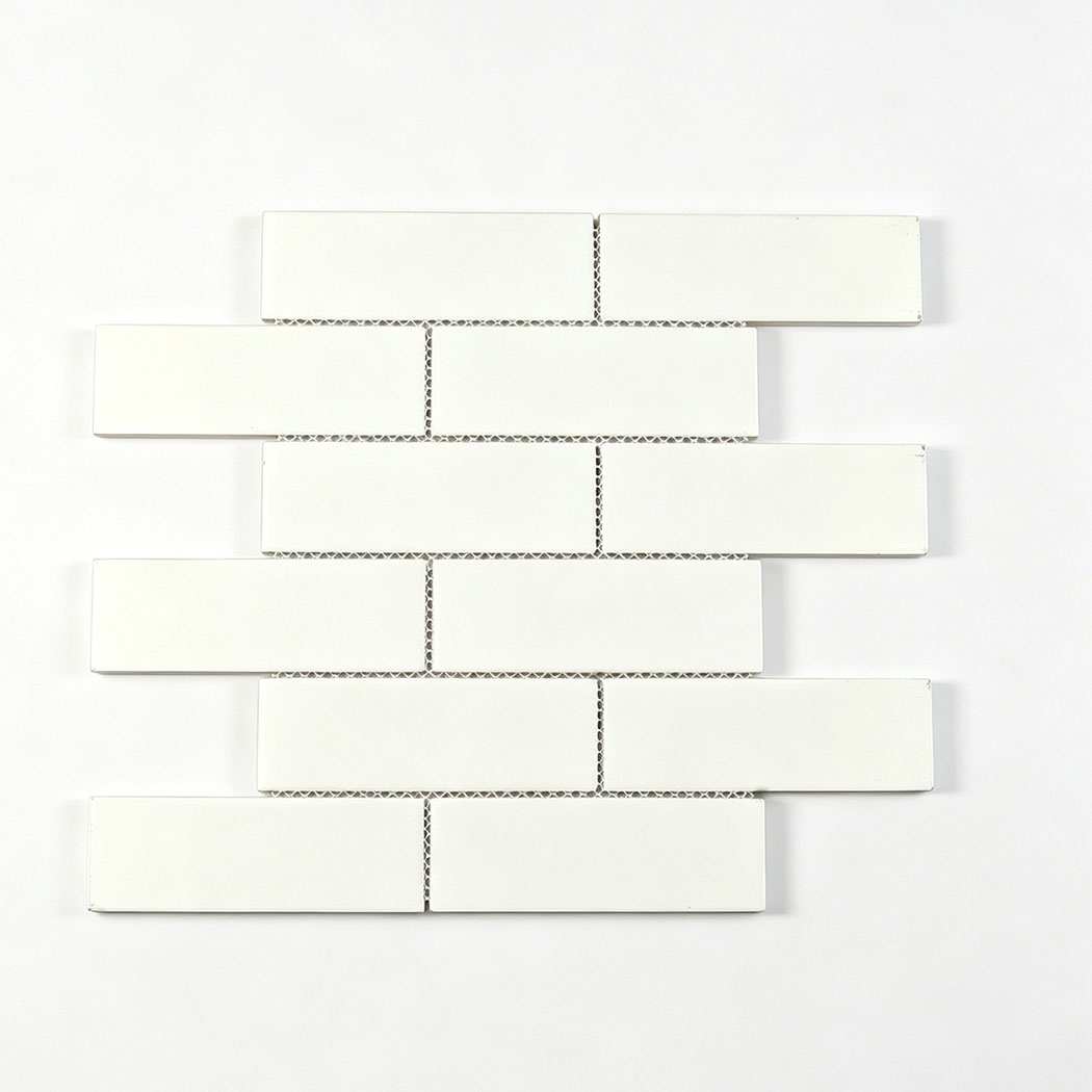 Back side of blue glass subway mosaic sheet with white mesh backing