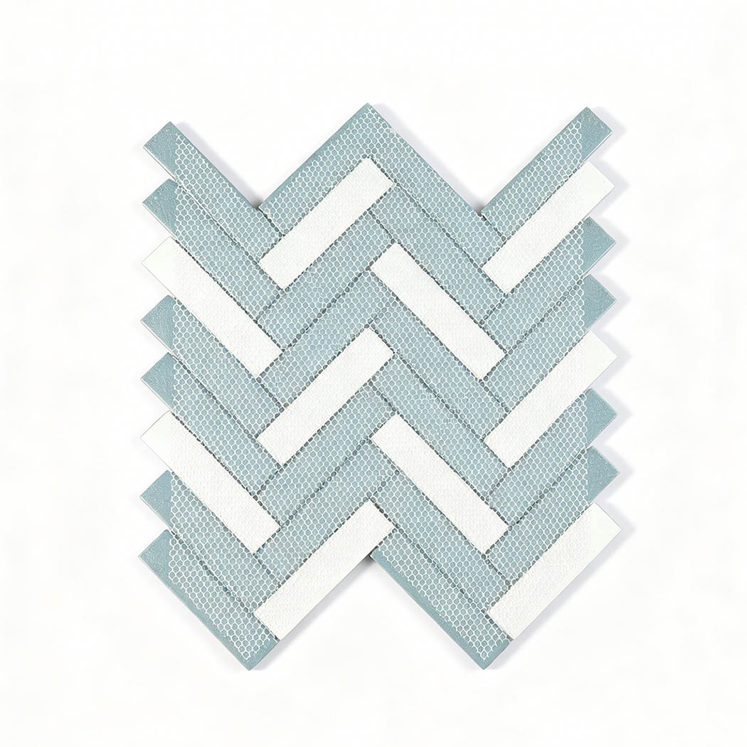 Back view of aqua gray herringbone mosaic tile sheet with white mesh backing