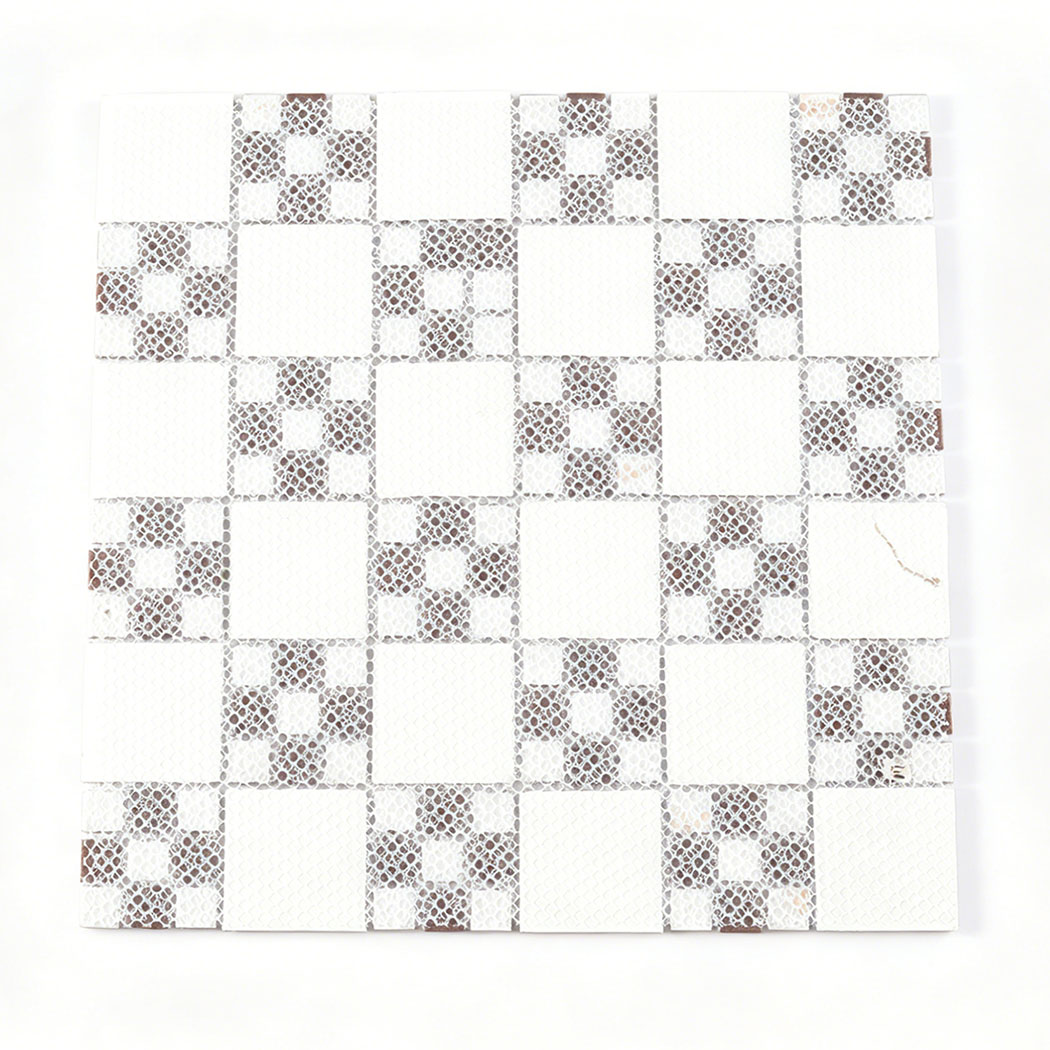 Back view of dark brown veined and amber cream glass mosaic with white mesh backing