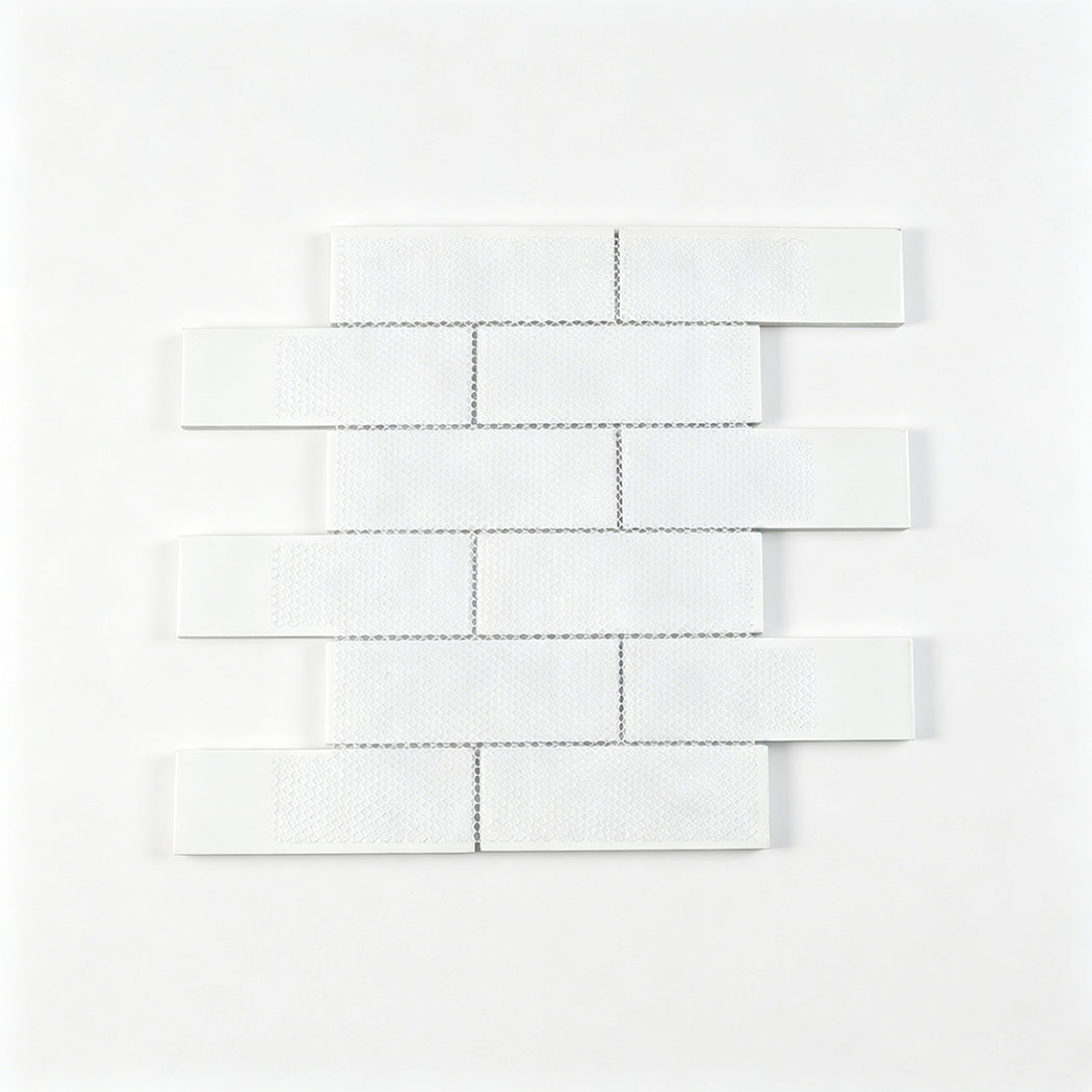 Back view of pale blue glass subway tile sheet on white mesh backing