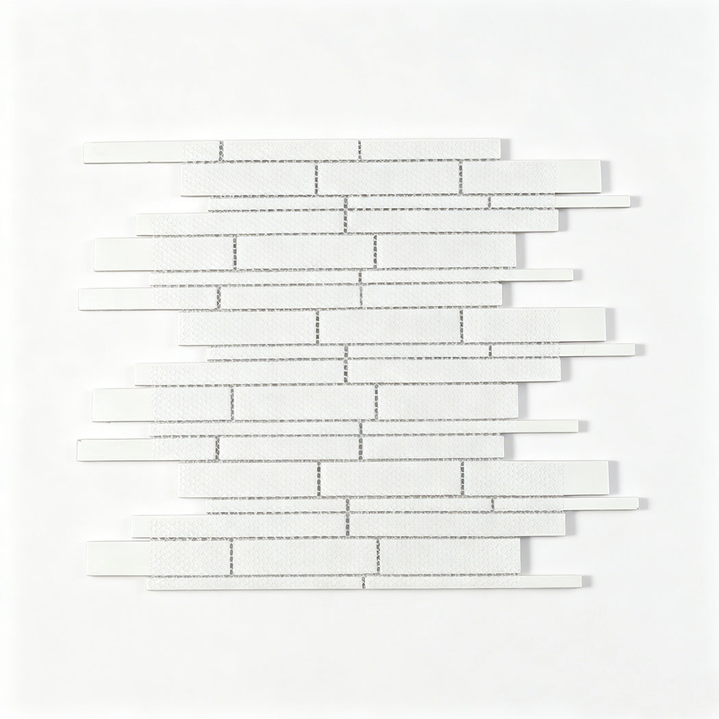 Back view of linear glass mosaic tile sheet with white mesh mounted backing