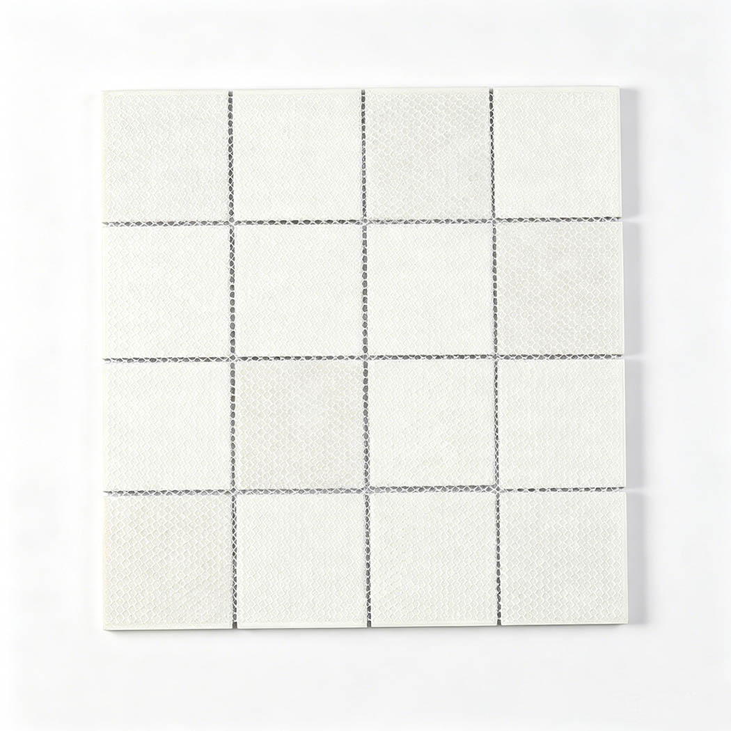Back side of square glass mosaic sheet with white mesh mounting