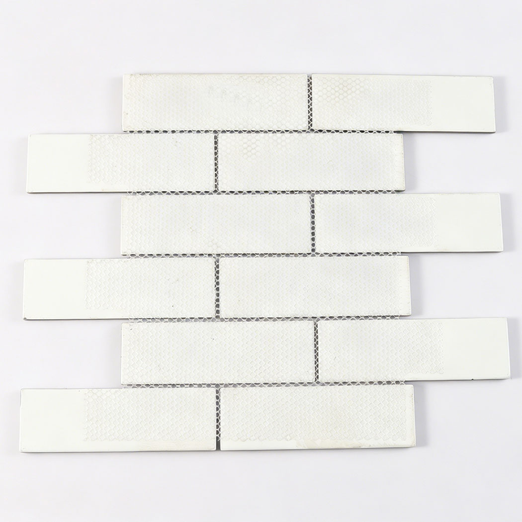 White mesh mounted back view of glass subway tile sheet