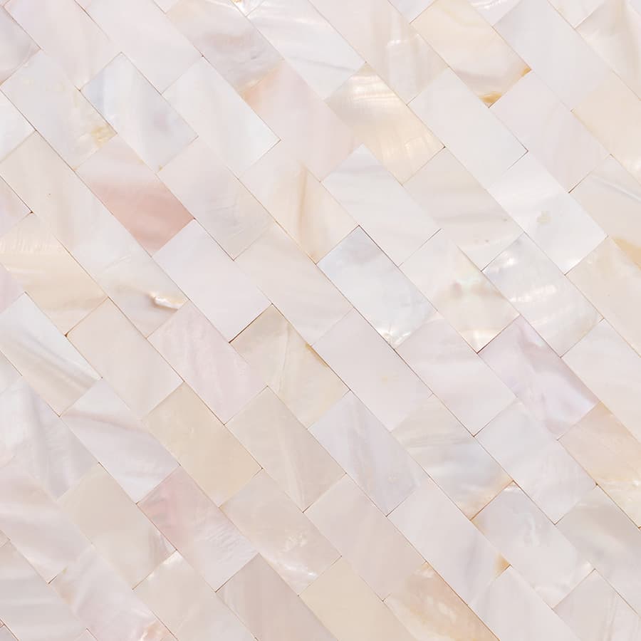 Macro view of polished white mother of pearl subway tile pattern