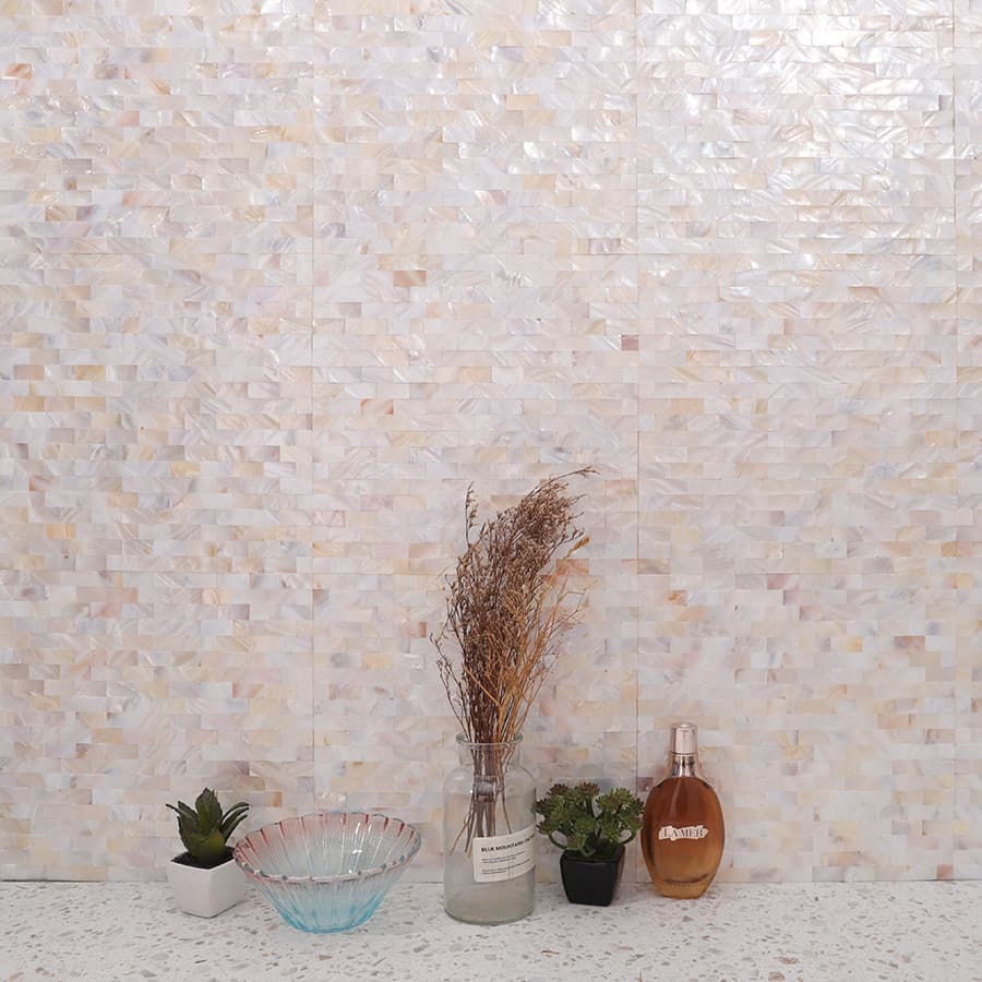 Wall decorated with white mother of pearl subway mosaic tiles