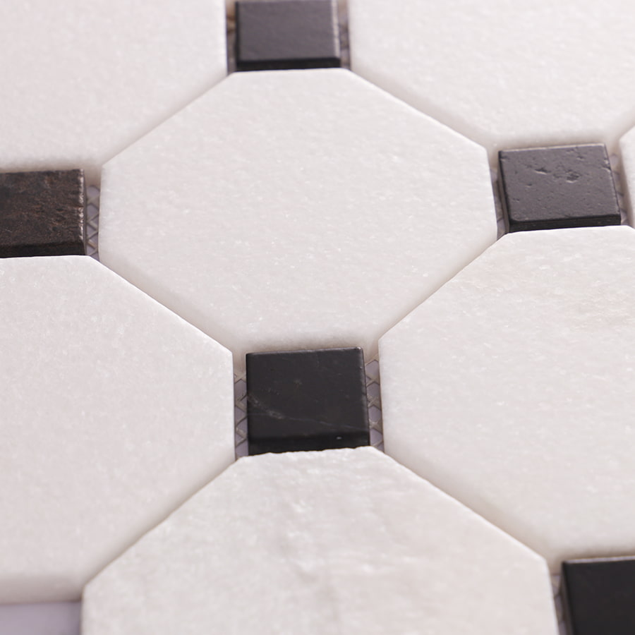 Close-up of white octagon marble mosaic with black square accents