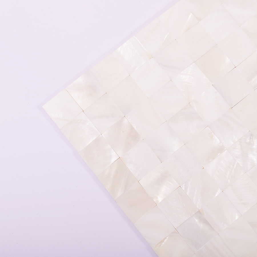  Corner close-up of 20mm white shell mosaic showing smooth surface and layout