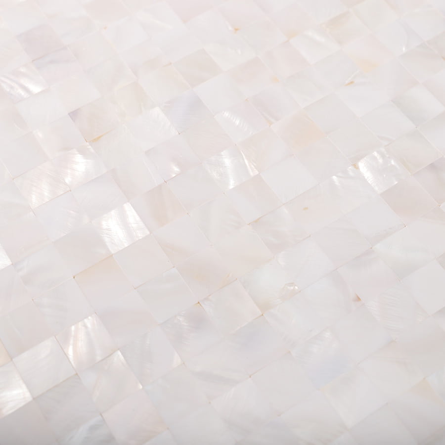 Surface texture of white shell mosaic tile up close