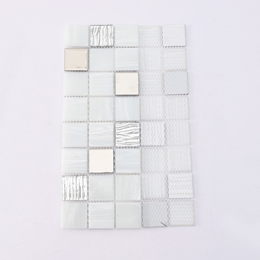 Back side view of mosaic tile sheet showing mesh backing