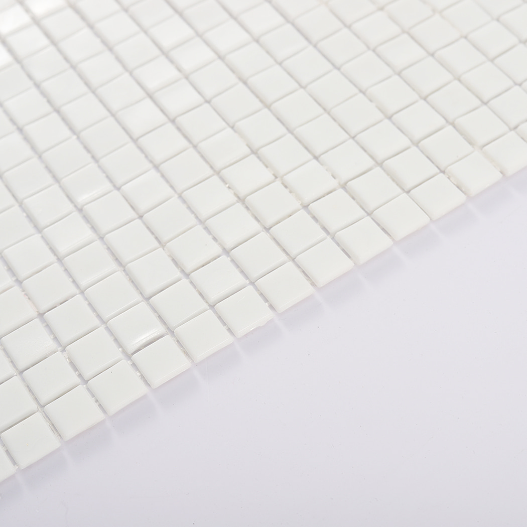 Side edge view of white square mosaic tile showing thickness and alignment