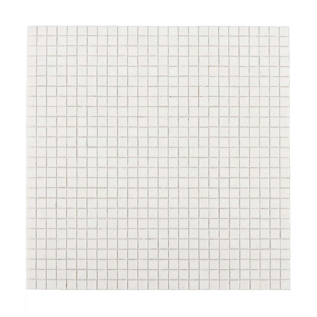 Full view of a white square ceramic mosaic tile sheet on a flat surface