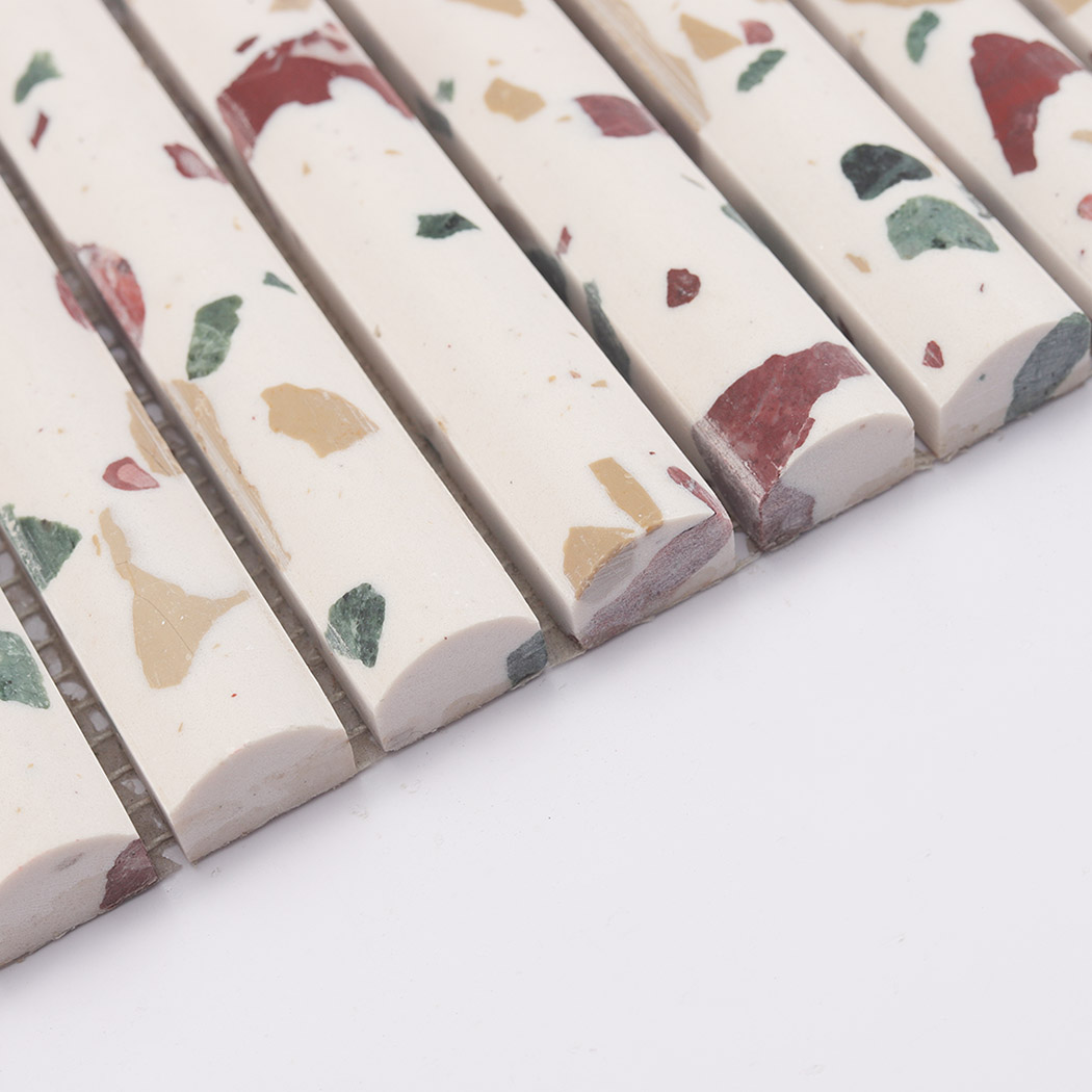 Edge profile of white terrazzo fluted mosaic tile with rounded strip design