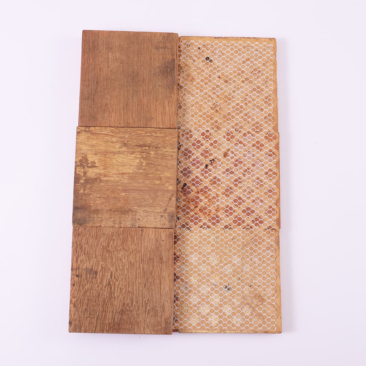 Back view of wood mosaic tile with mesh backing for installation