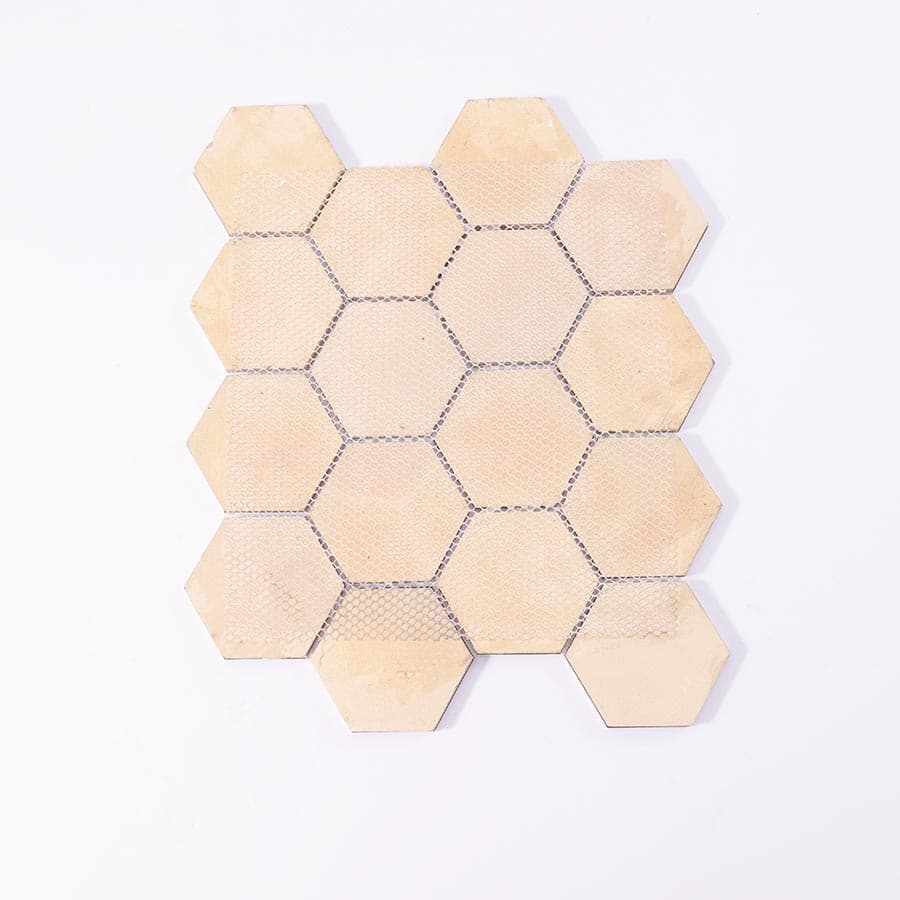Back view showing mesh backing of wood pattern hexagon aluminum mosaic tile