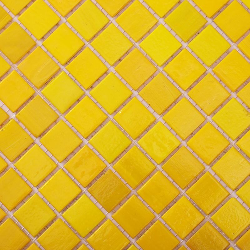 Close-up of yellow square glass mosaic tile for pool walls