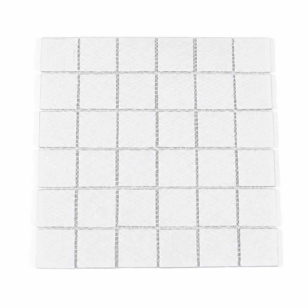 Back view of yellow square glass mosaic tile sheet with white mesh backing