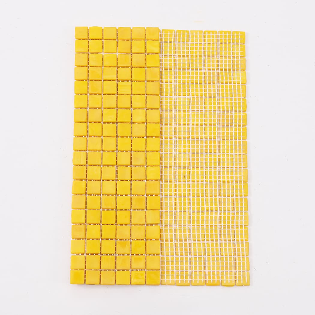 Yellow square glass mosaic tile sheet with front and mesh backing view