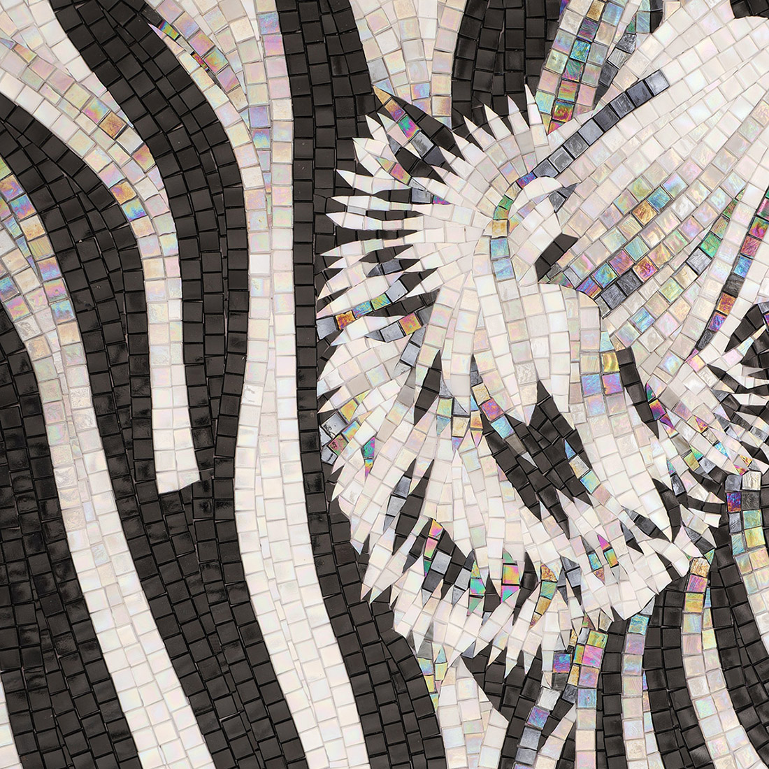 Handmade zebra mosaic detail showing the ear, mane, and striped body