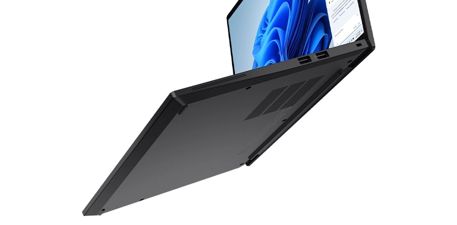 Cut-short, right side view of the Lenovo ThinkPad T14s Gen5 (14&rdquo; Intel) Eclipse Black laptop suspended in air, focusing its right side ports, rear air vents, & aluminum-based bottom cover.