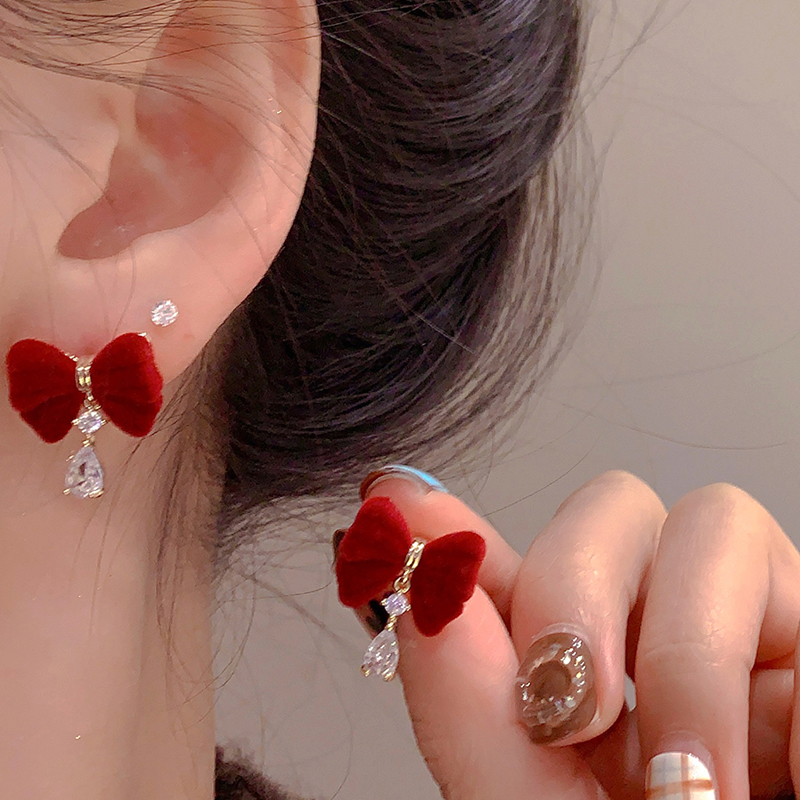 在逃公主蝴蝶結水晶耳環