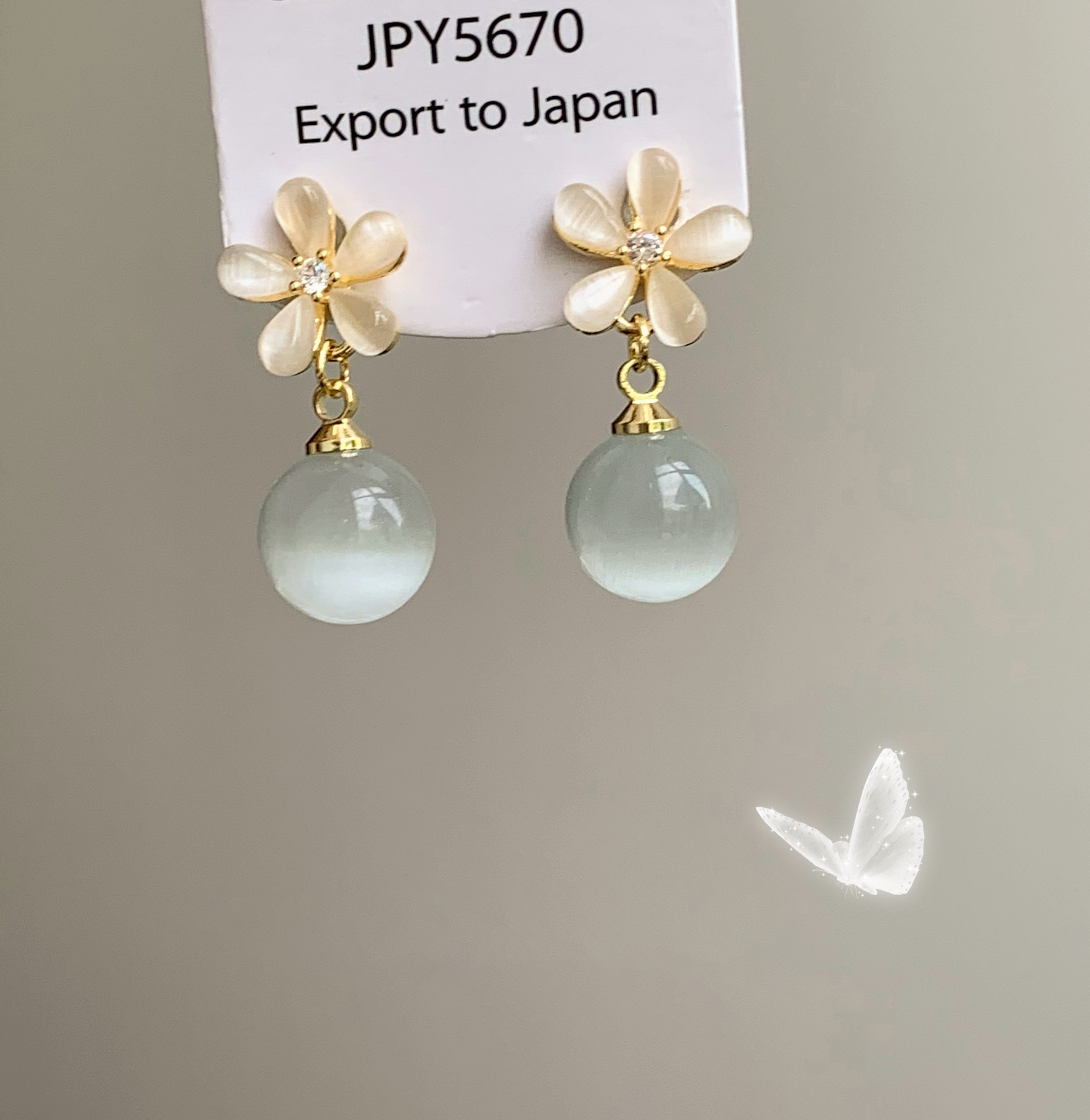 貓眼石花朵蚊香盤耳夾