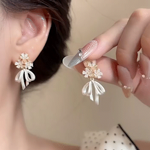 「花亦織夢」精緻蝴蝶結蚊香盤耳夾耳環