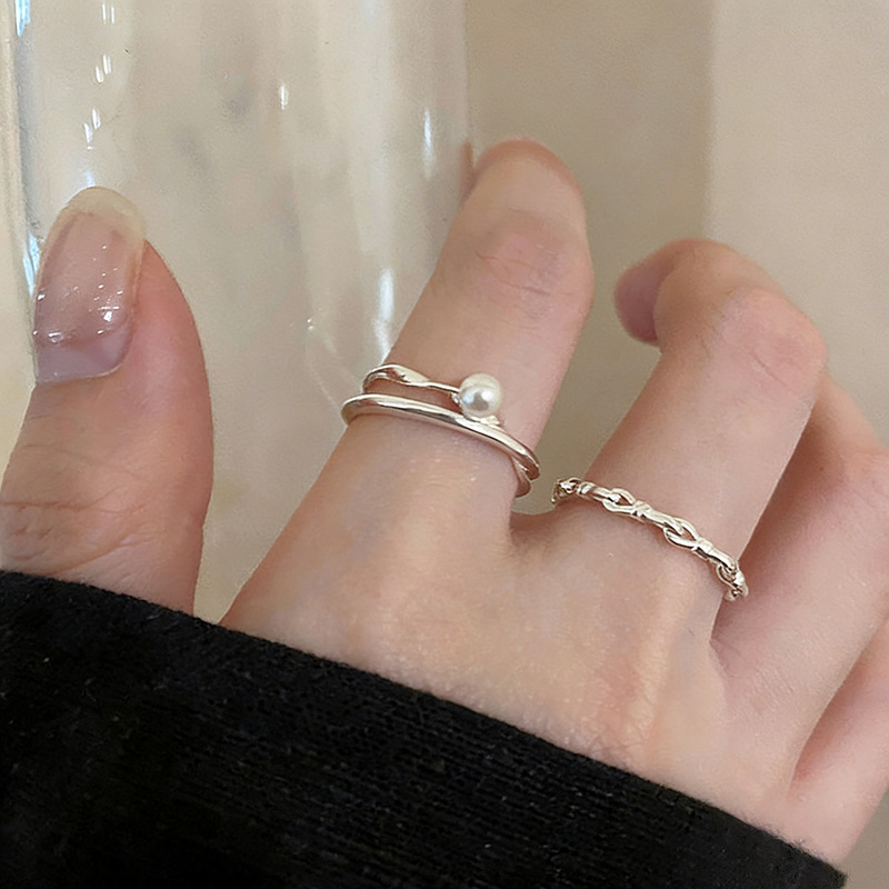 極簡高級感珍珠交叉戒指組