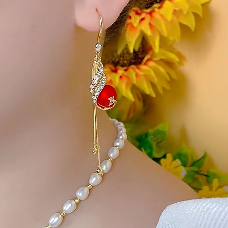 新潮長款紅孔雀流蘇耳環