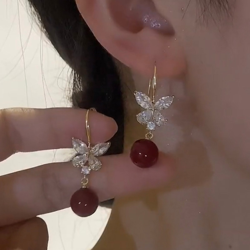 超閃蝴蝶結珍珠耳環