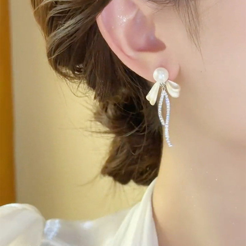 珍珠蝴蝶結流蘇耳環