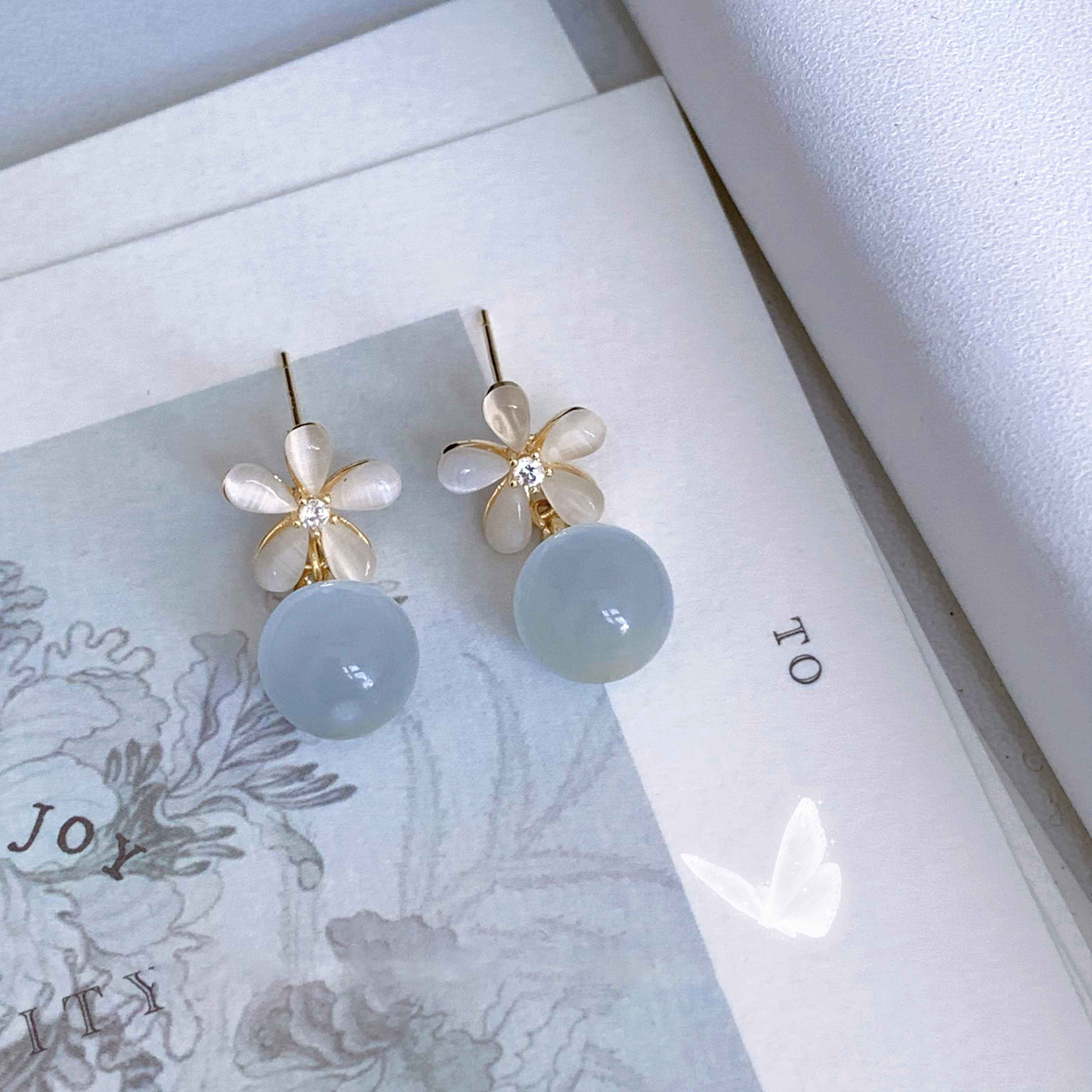 貓眼石花朵蚊香盤耳夾