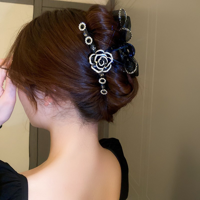 黑色山茶花蝴蝶結髮夾