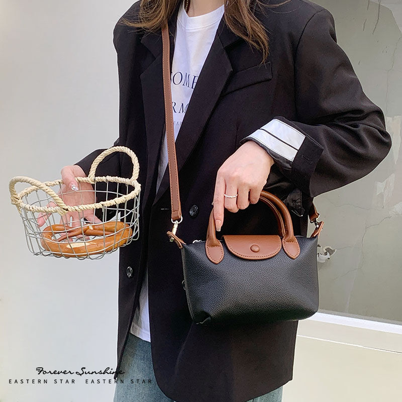 時尚百搭外出旅遊 斜跨手提輕便小包包