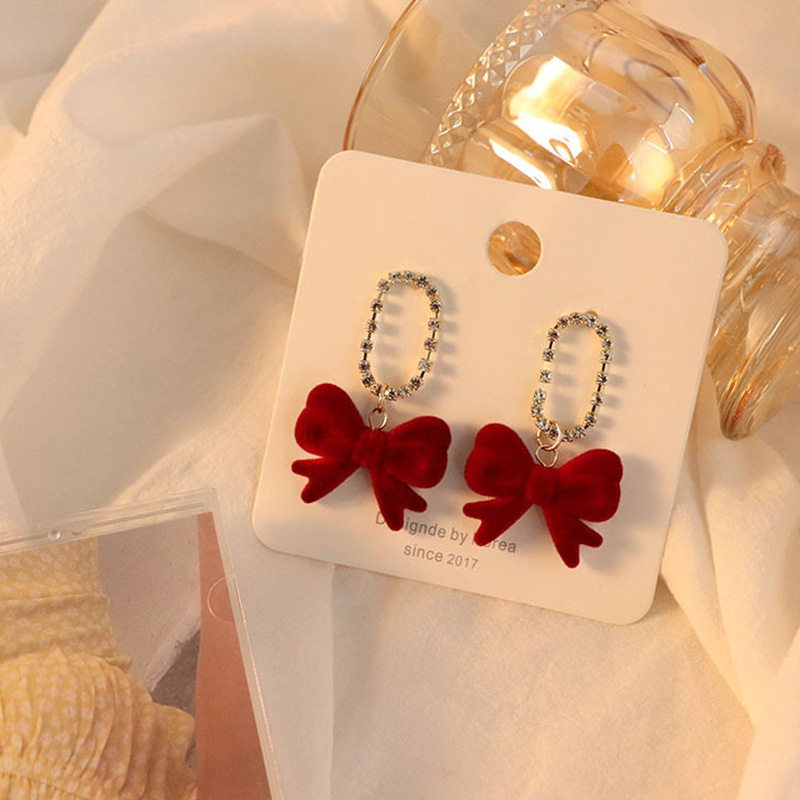 在逃公主蝴蝶結水晶耳環