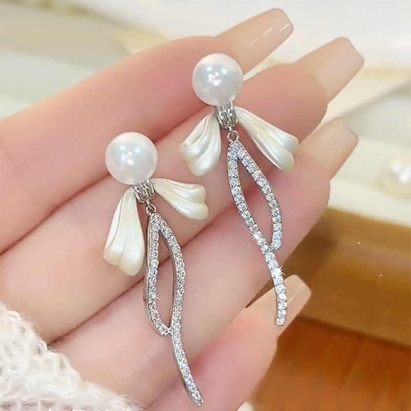 珍珠蝴蝶結流蘇耳環