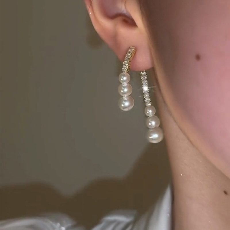 交叉珍珠鑲鑽耳環