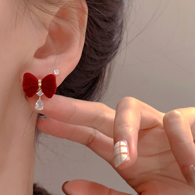 在逃公主蝴蝶結水晶耳環