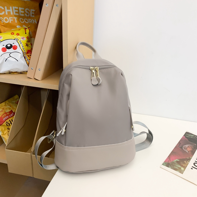 時尚輕便牛津布配真皮雙肩包