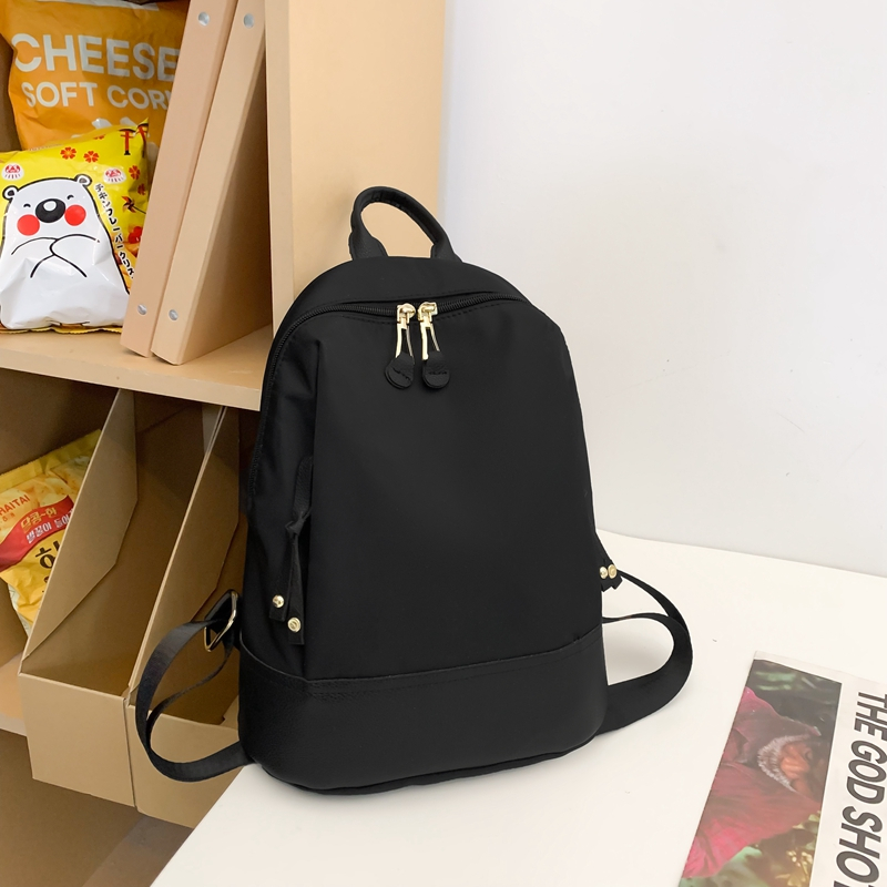 時尚輕便牛津布配真皮雙肩包