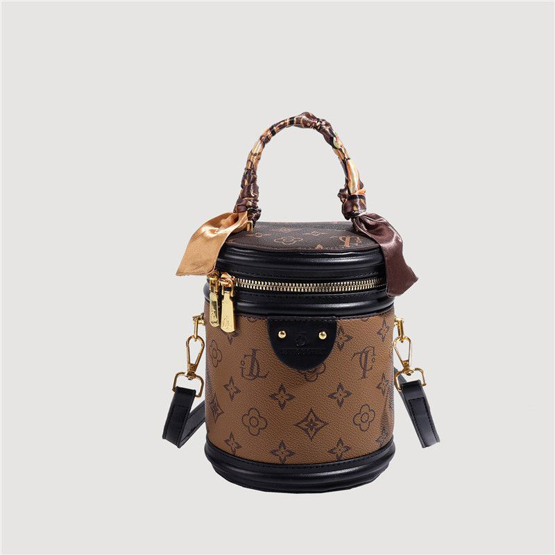 復古印花水桶包包