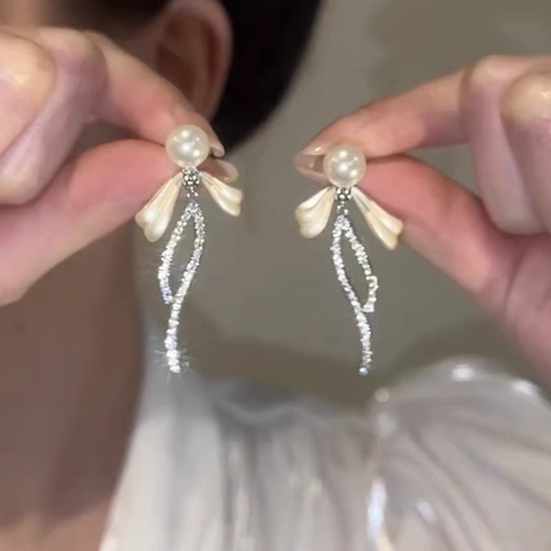 珍珠蝴蝶結流蘇耳環