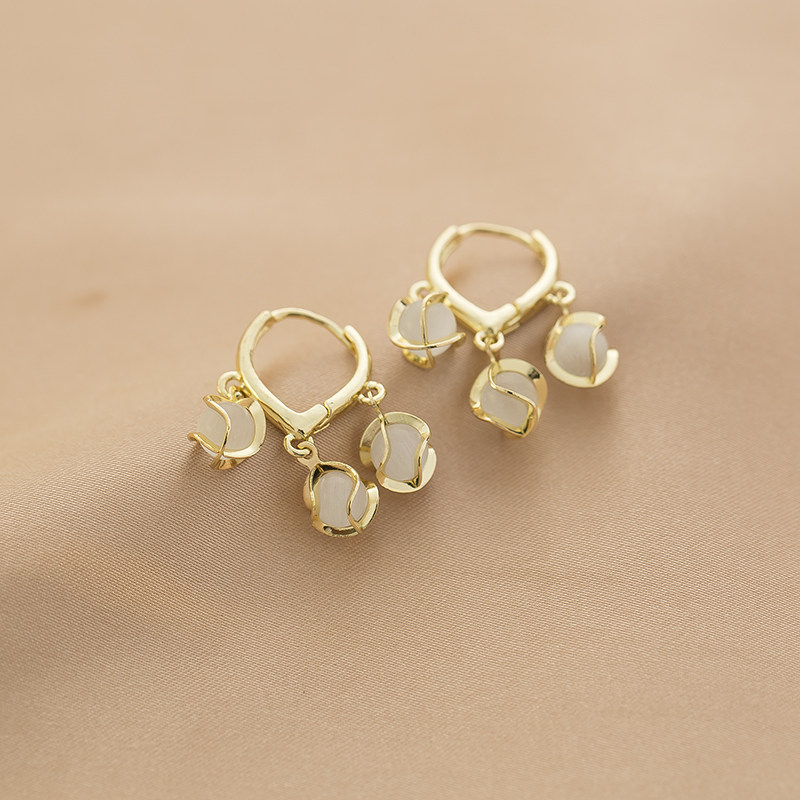 溫柔森系鈴蘭花貓眼石耳環