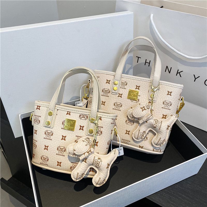 復古印花單件斜跨手提水桶包