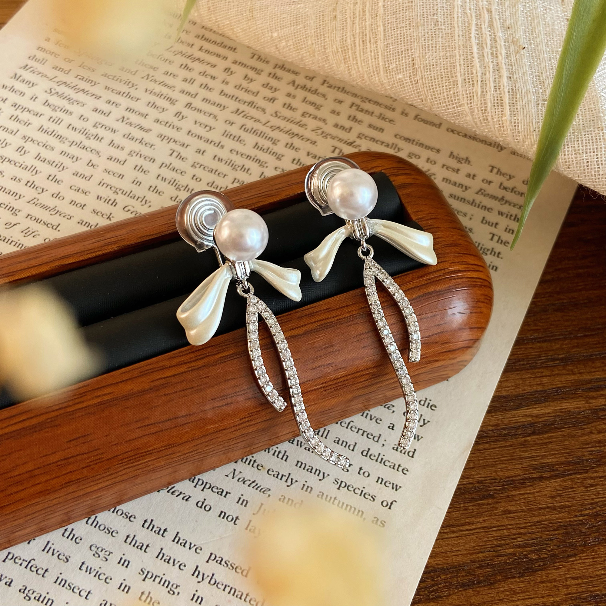 珍珠蝴蝶結流蘇耳環