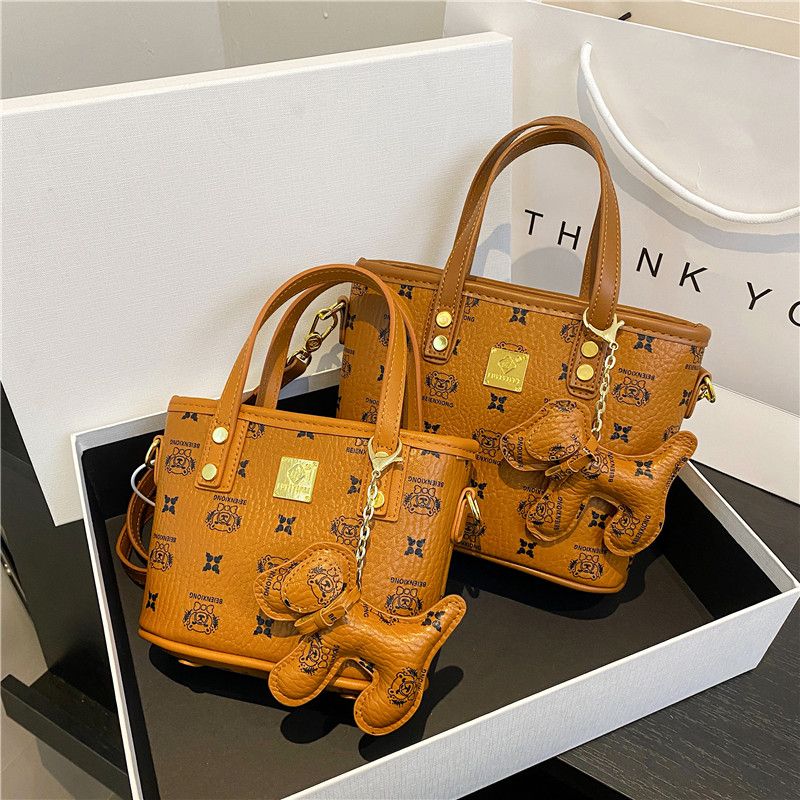 復古印花單件斜跨手提水桶包