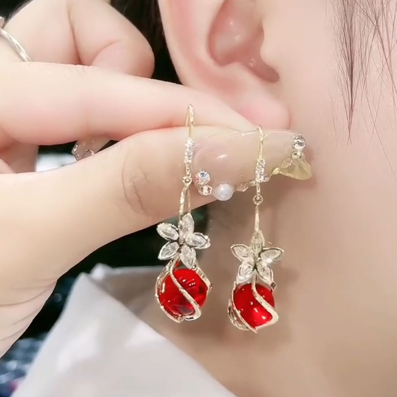 精致貓眼石花朵流蘇耳環