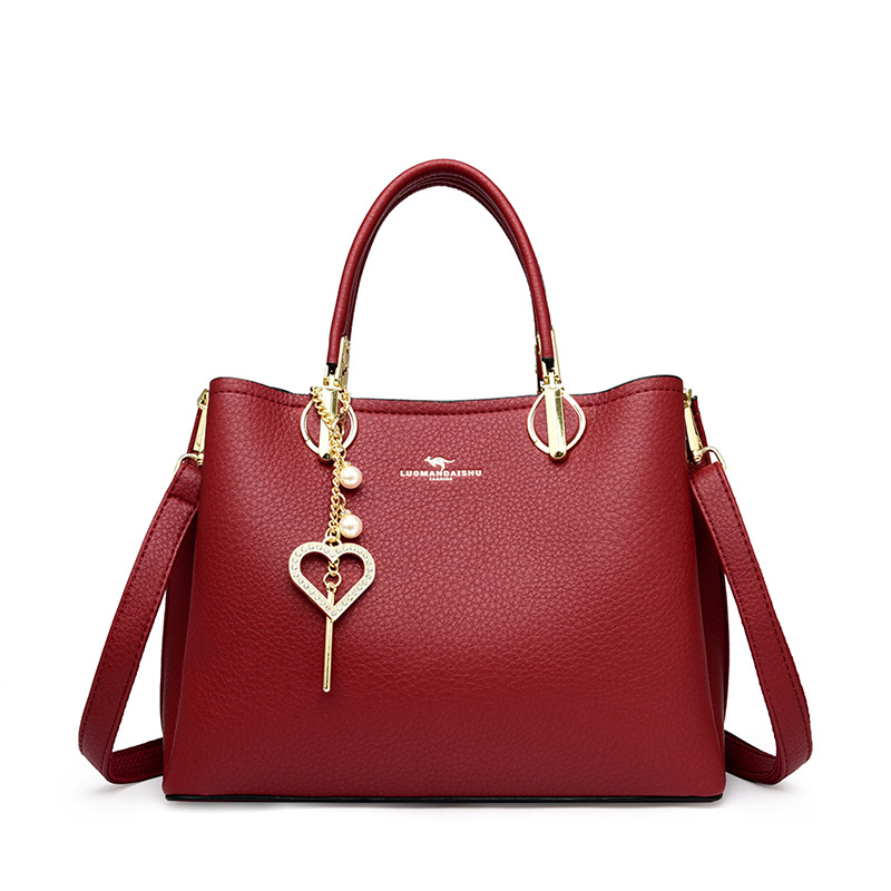 【沫緹甄選】韓式女包優質PU皮革時尚時髦女士手提包愛心飾品斜挎包