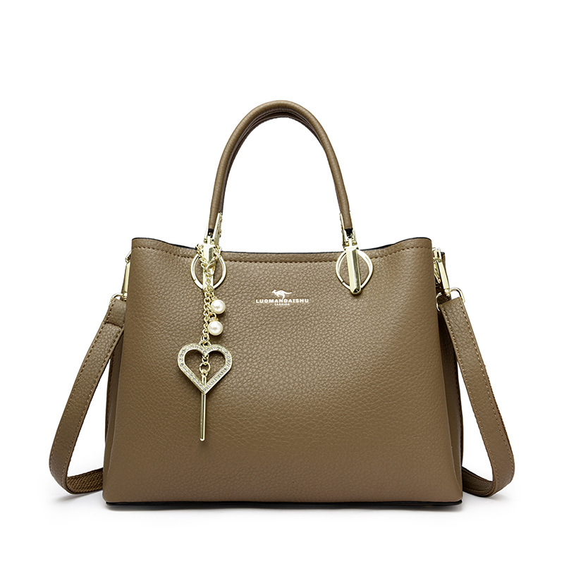 【沫緹甄選】韓式女包優質PU皮革時尚時髦女士手提包愛心飾品斜挎包